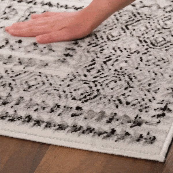 
                      
                        Greig Area Rug
                      
                    
