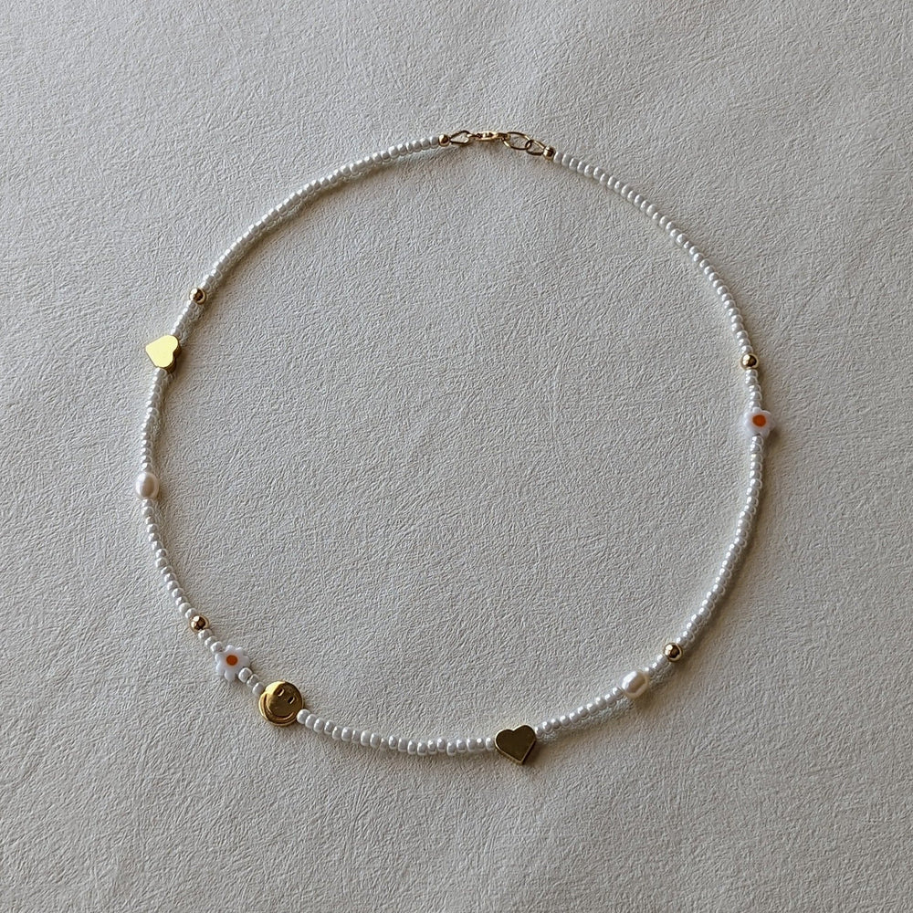 
                      
                        Beaded Charm Necklace
                      
                    