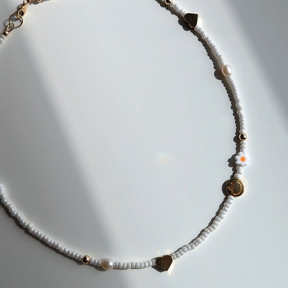 
                      
                        Beaded Charm Necklace
                      
                    