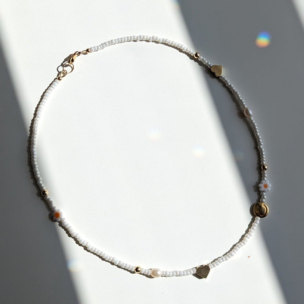 
                      
                        Beaded Charm Necklace
                      
                    