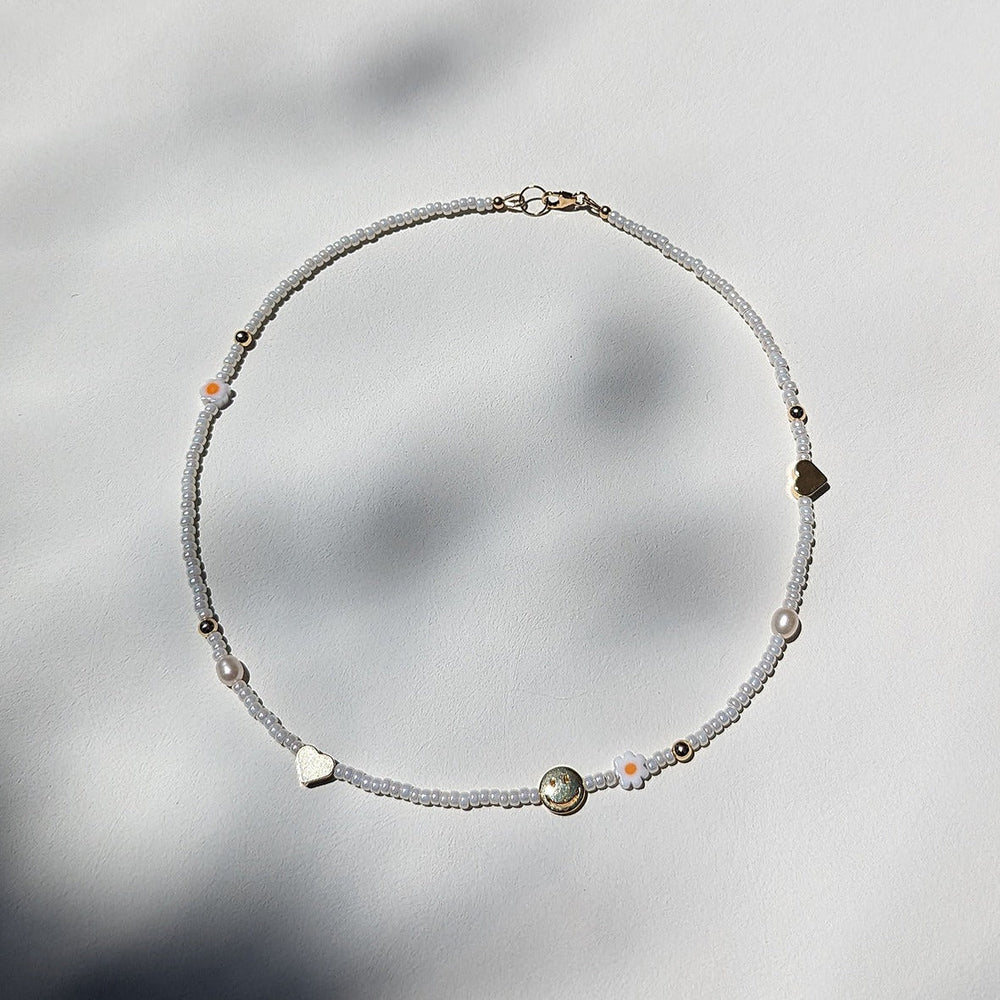 
                      
                        Beaded Charm Necklace
                      
                    
