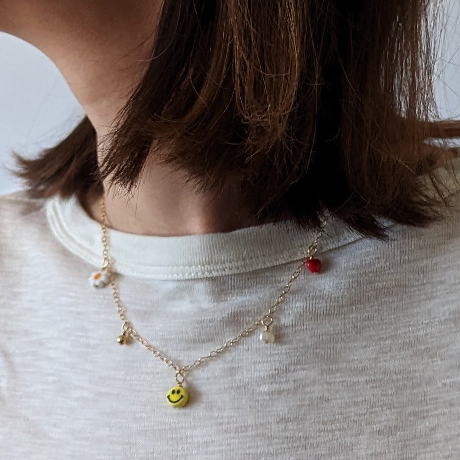 
                      
                        Multi Charm Necklace
                      
                    