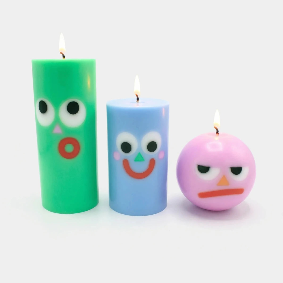 54Celsius Moodz Grumpy Round Face Candle – Pink