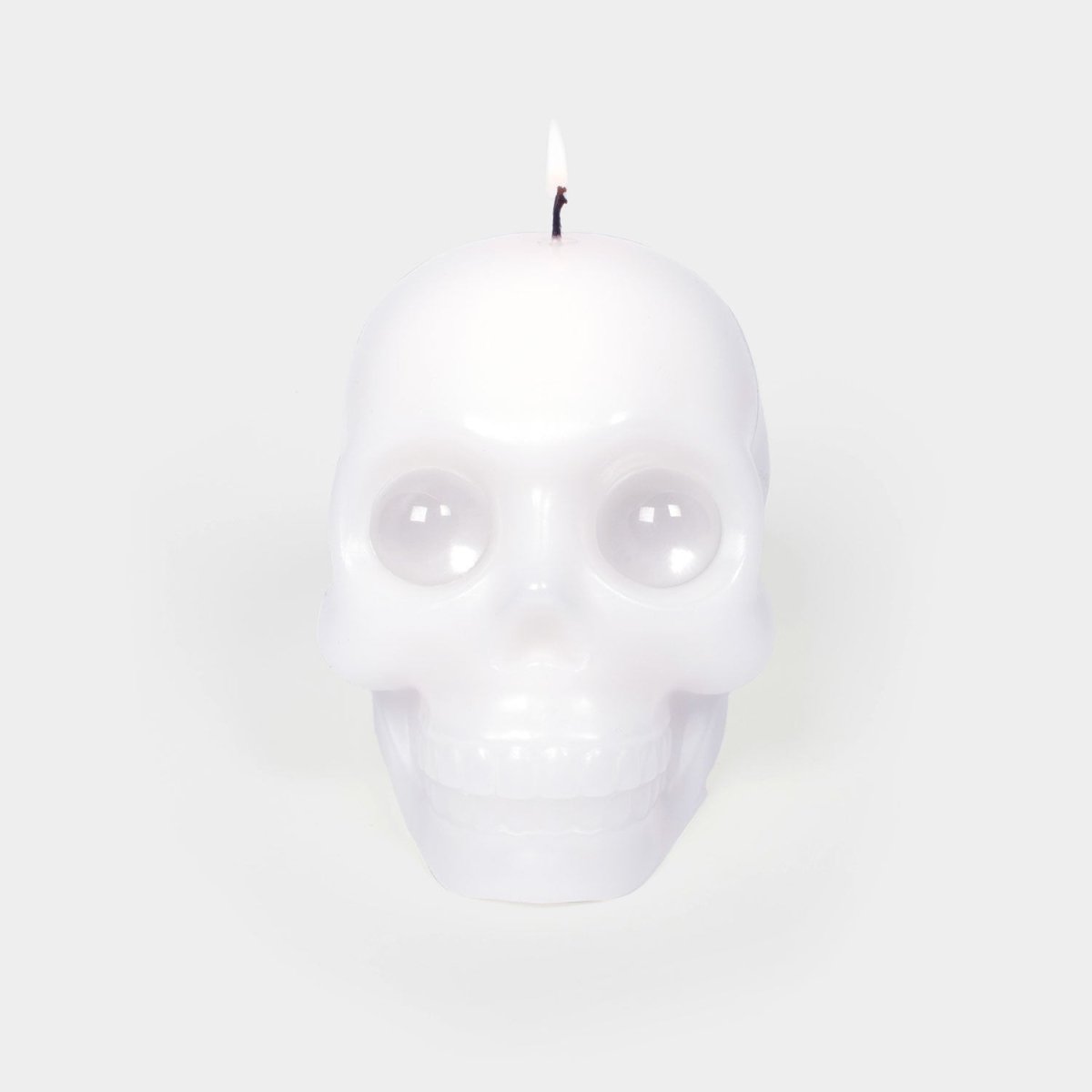 54Celsius White Skull Candle with Artificial Crystal Eyes