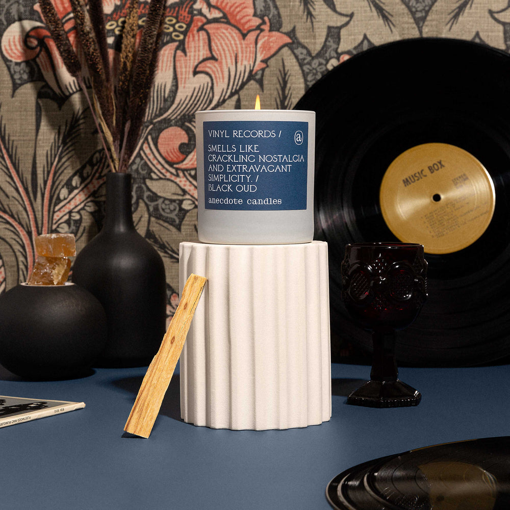 
                      
                        Vinyl Records Candle
                      
                    