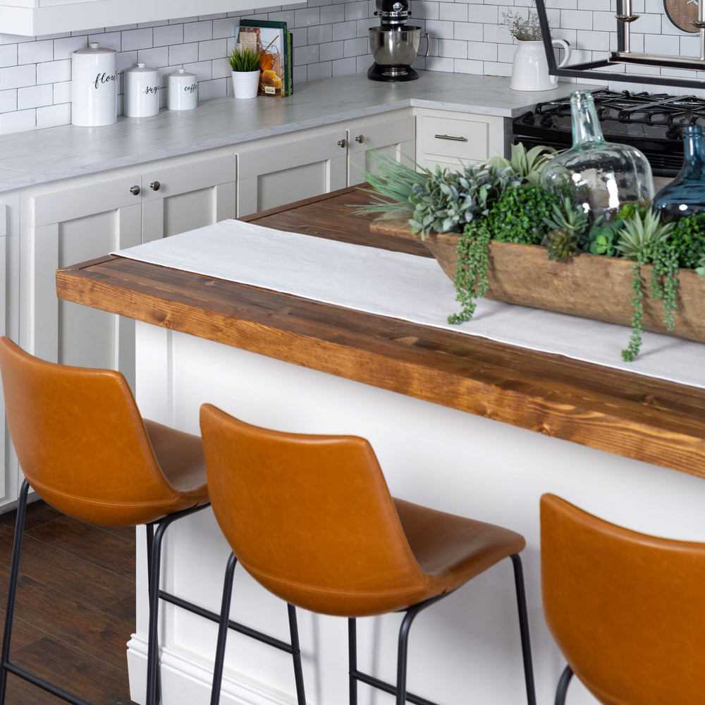 
                      
                        Faux Leather Bar Stools
                      
                    
