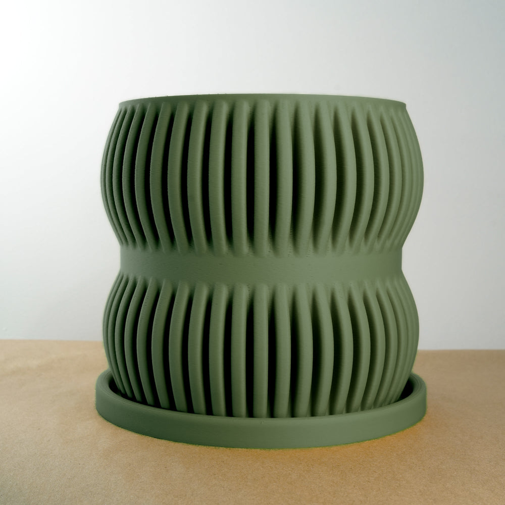 
                      
                        Aureus Ribbed Plant Pot
                      
                    
