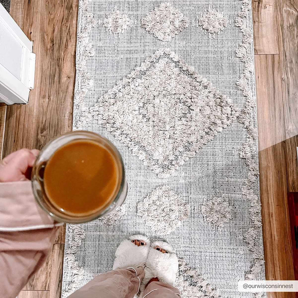 
                      
                        Ampusungan Area Rug
                      
                    