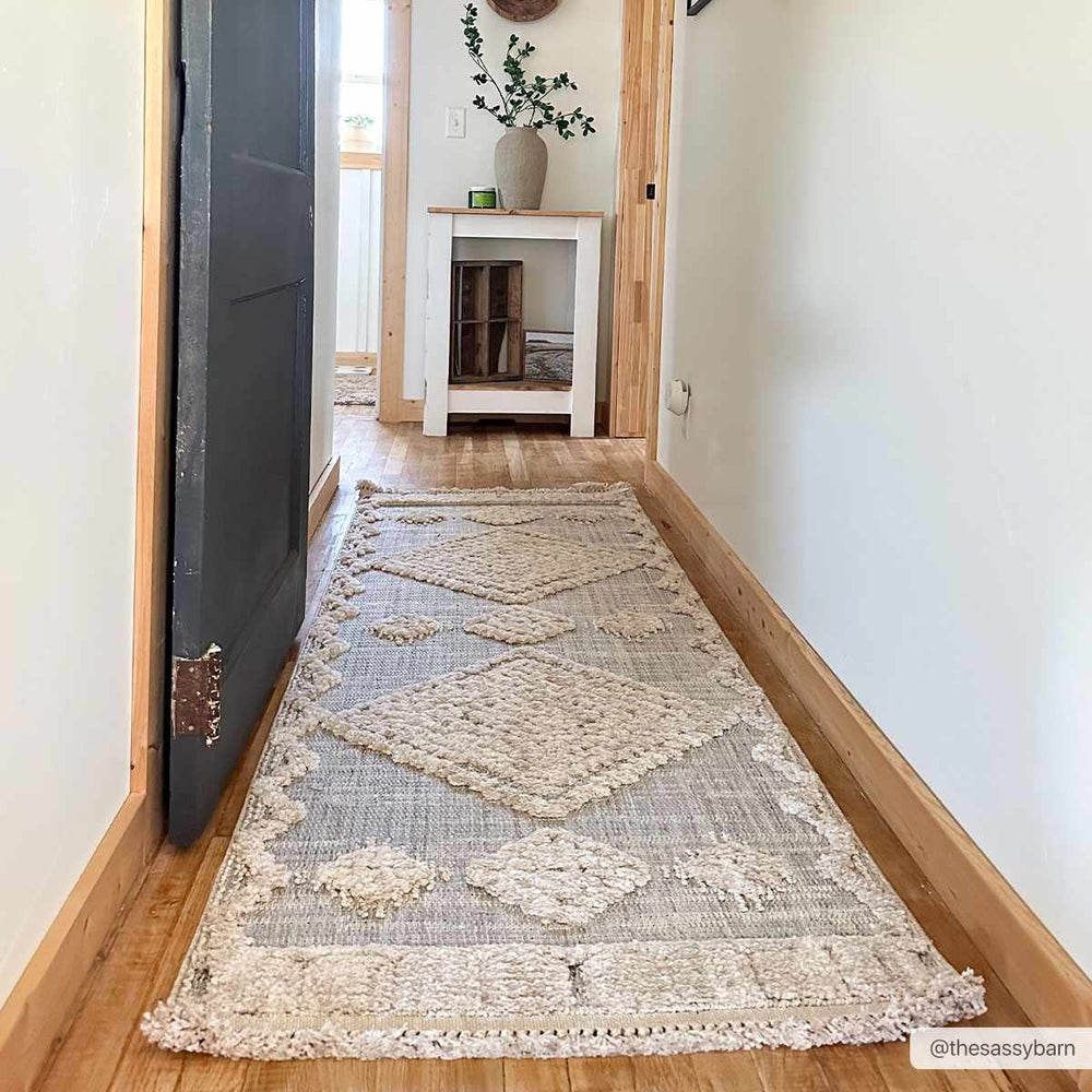 
                      
                        Ampusungan Area Rug
                      
                    