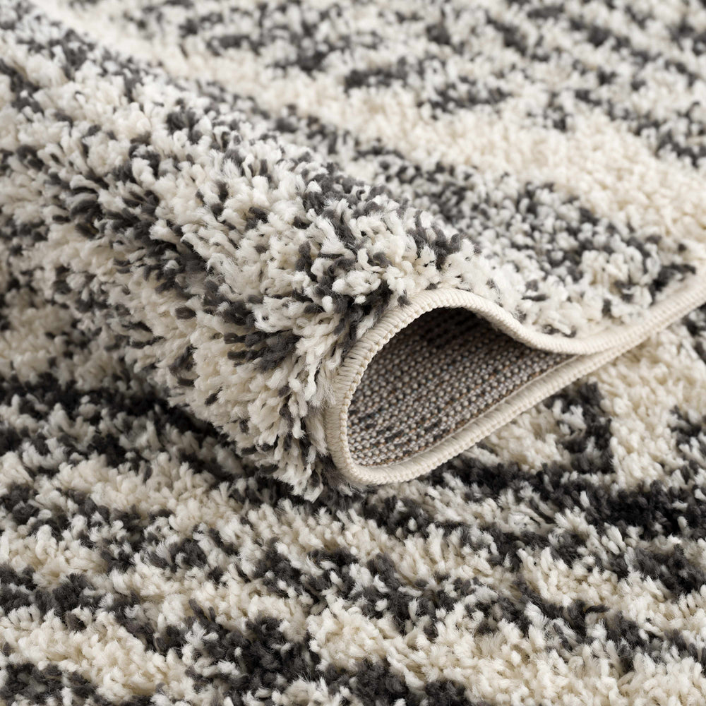 
                      
                        Fishhook Area Rug
                      
                    