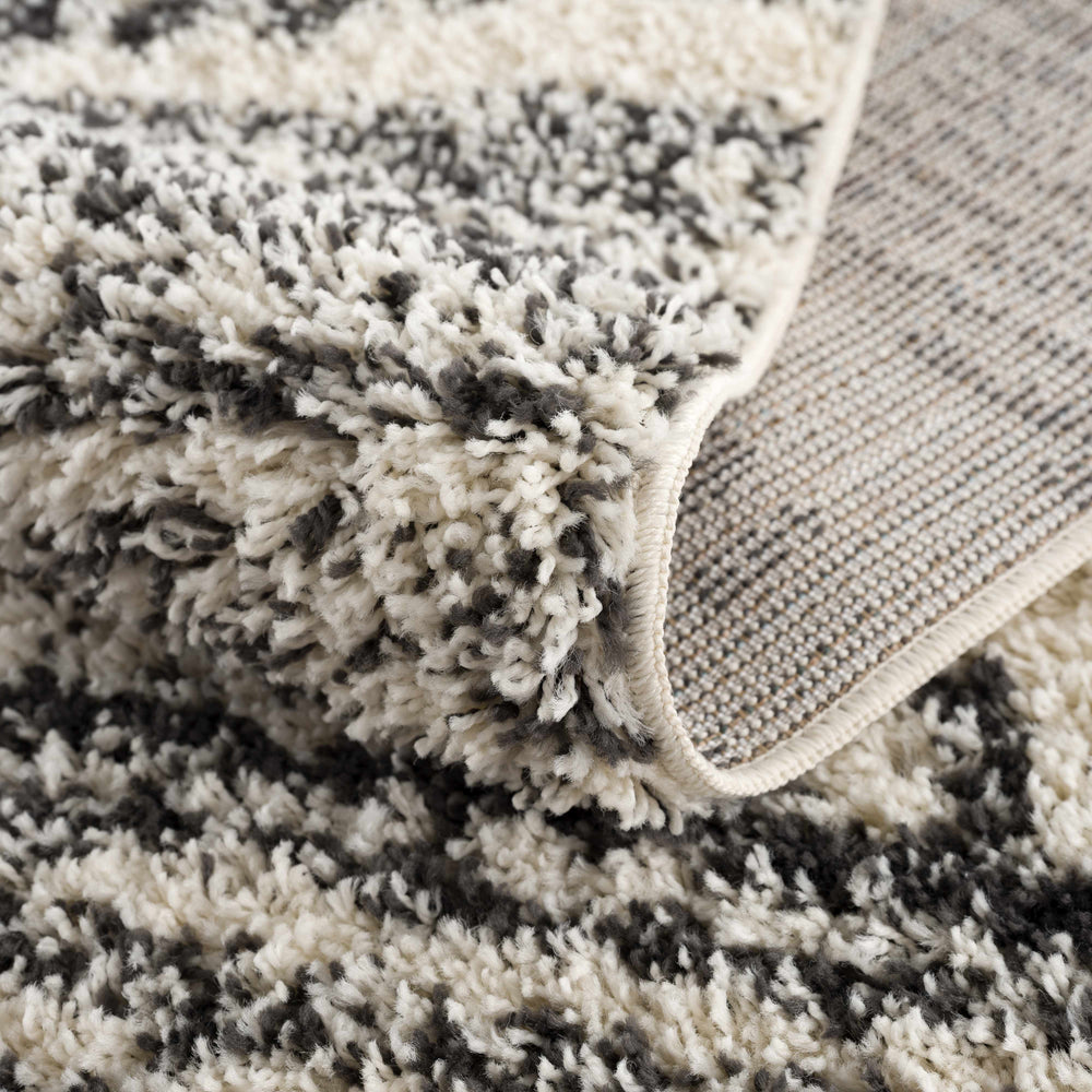 
                      
                        Fishhook Area Rug
                      
                    