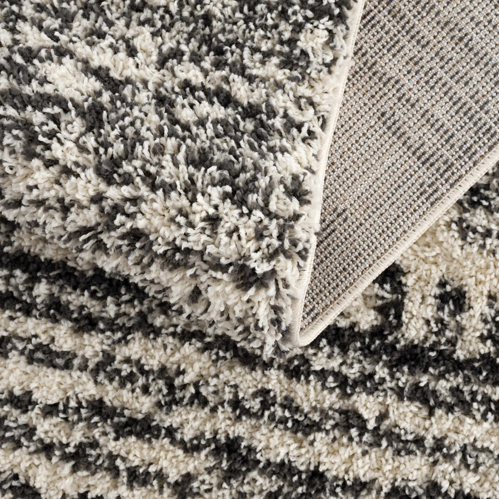 
                      
                        Fishhook Area Rug
                      
                    