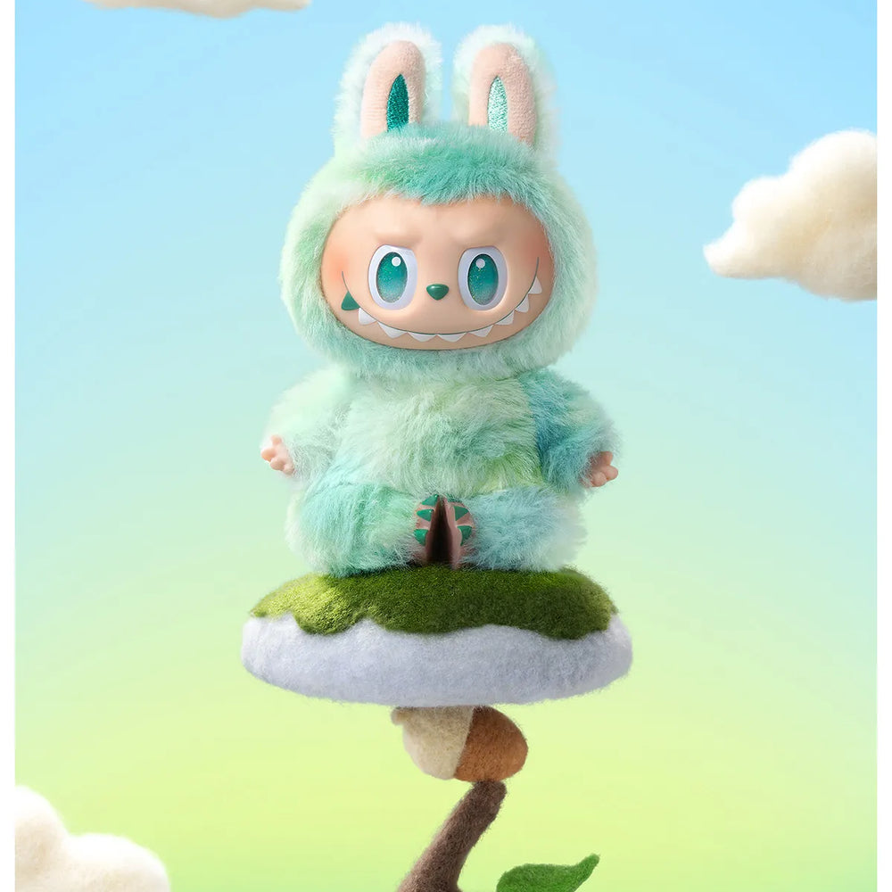 
                      
                        The MONSTERS Big Into Energy series SERENITY Labubu sitting on a felt cloud, with a blue sky background.
                      
                    