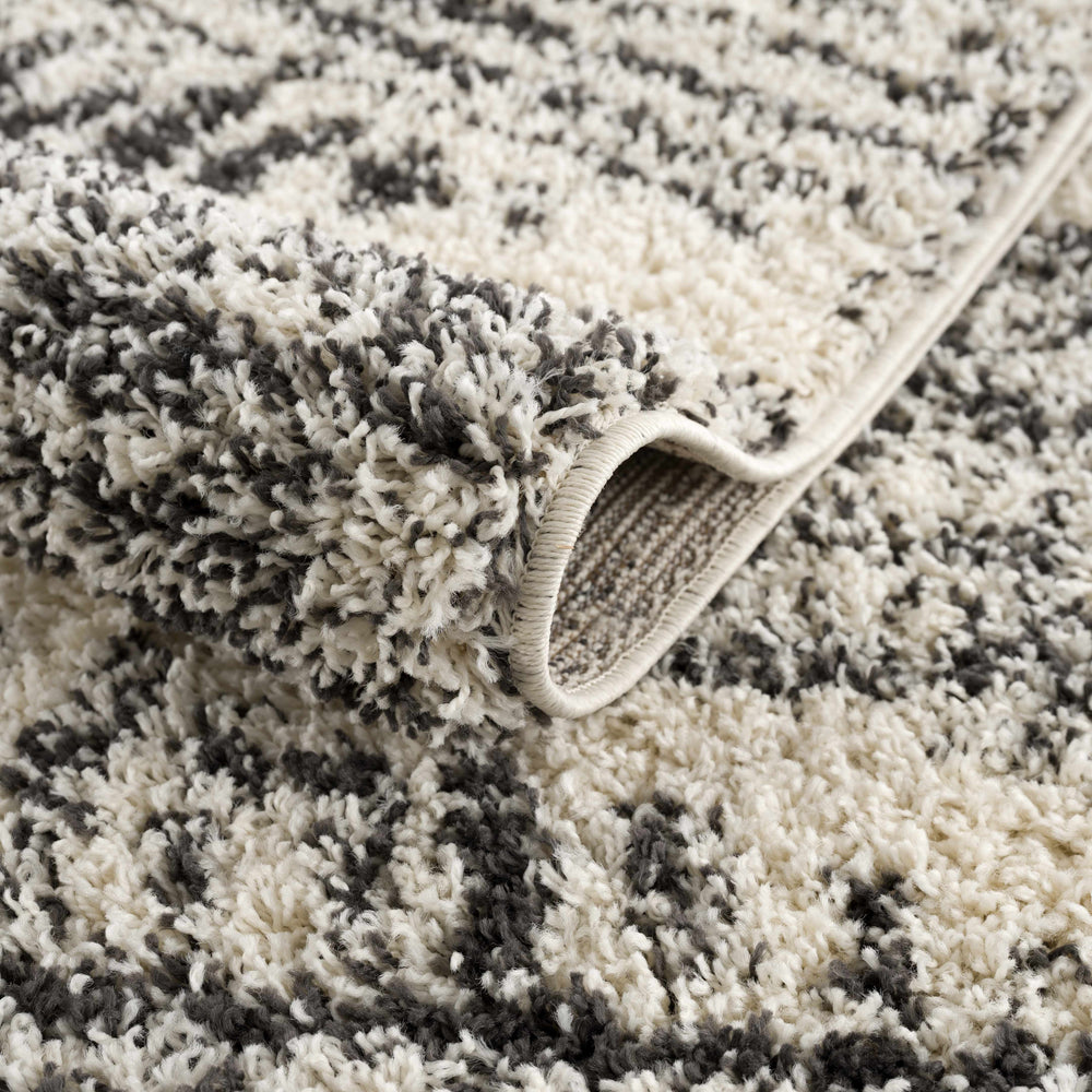 
                      
                        Fishhook Area Rug
                      
                    