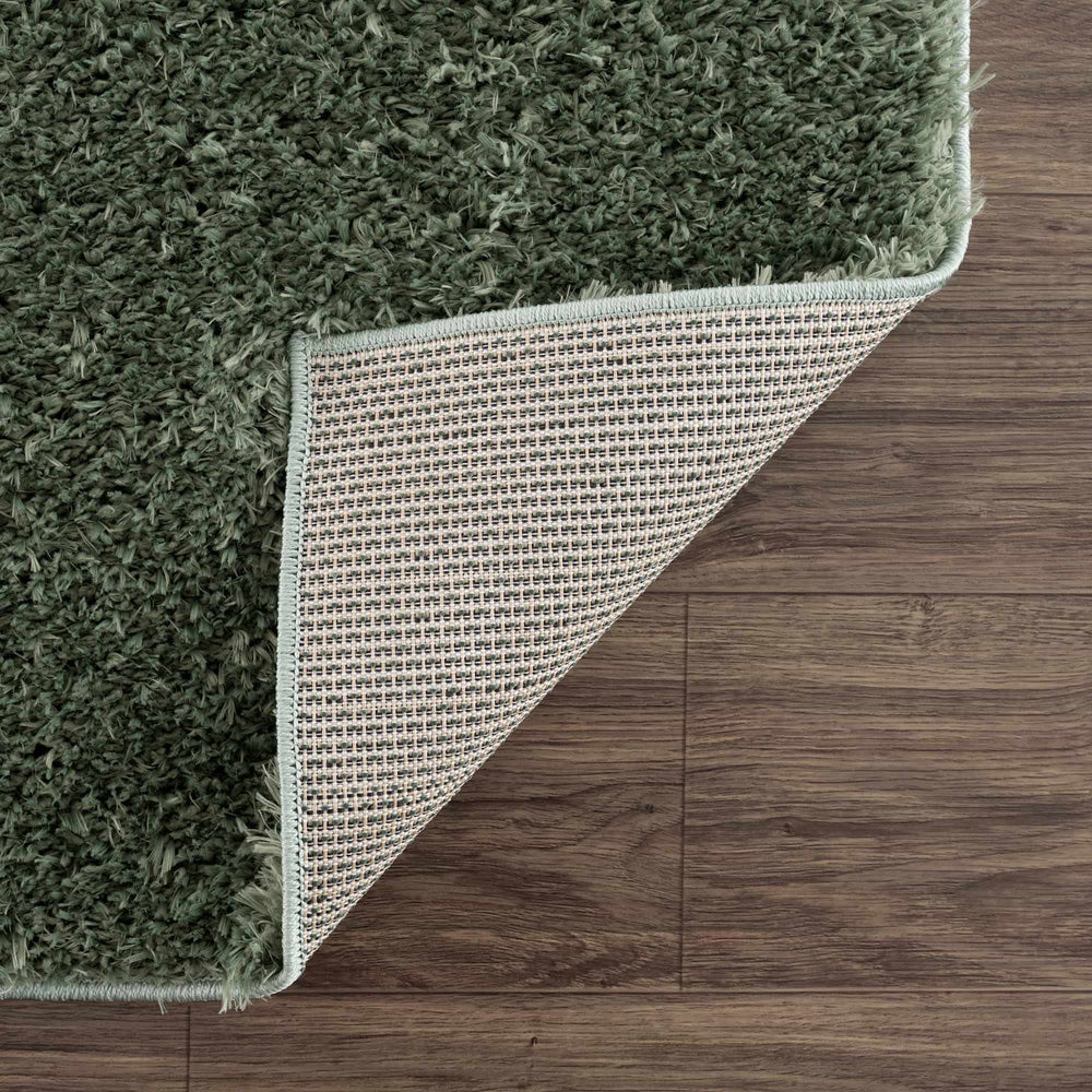
                      
                        Faina Solid Green Washable Shag Rug
                      
                    