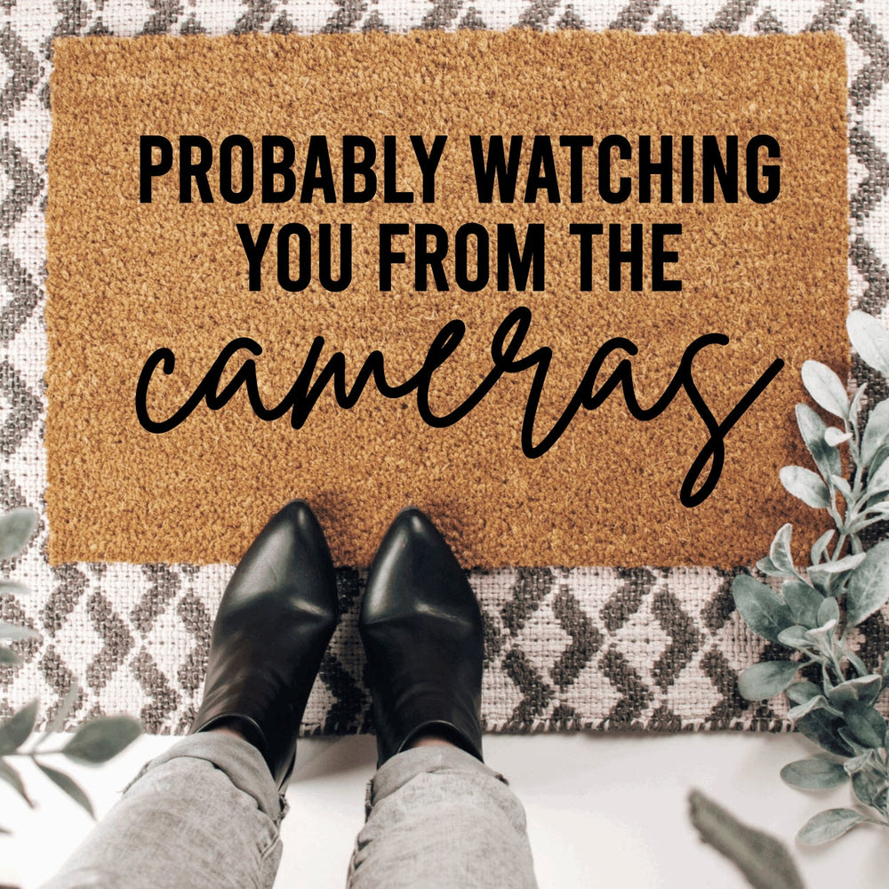 Probably Watching You From The Cameras Doormat