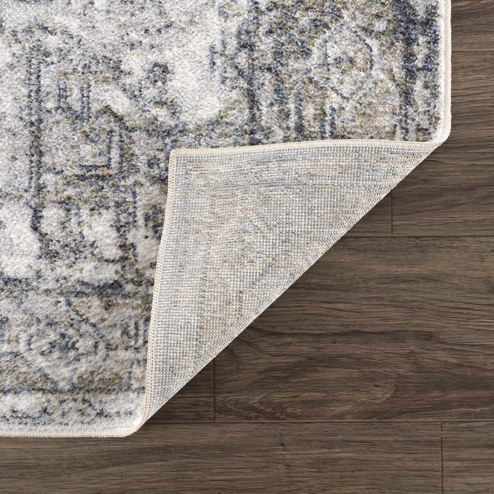 
                      
                        Hera Blue Washable Area Rug
                      
                    