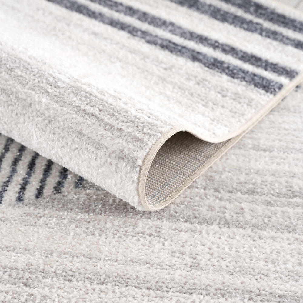 
                      
                        Thad Washable Area Rug
                      
                    