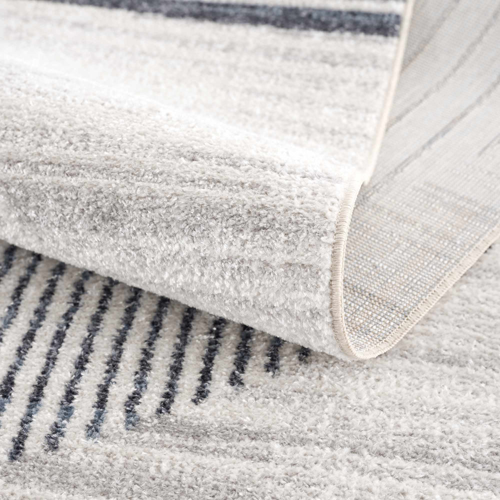 
                      
                        Thad Washable Area Rug
                      
                    