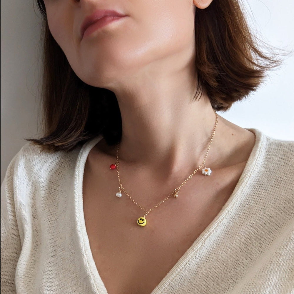 
                      
                        Multi Charm Necklace
                      
                    