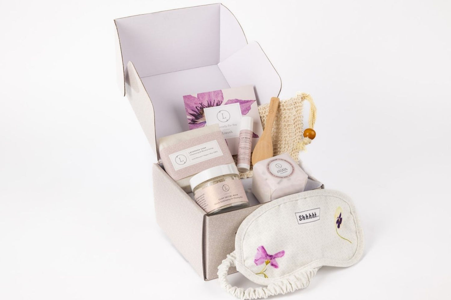 Purple lavender bath and body set in a decorative gift box by Lizush, featuring natural skincare products.