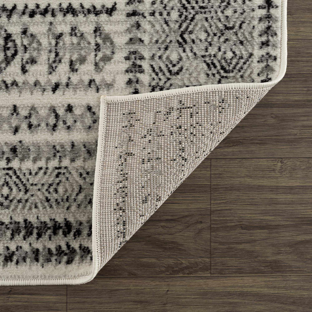 
                      
                        Greig Area Rug
                      
                    