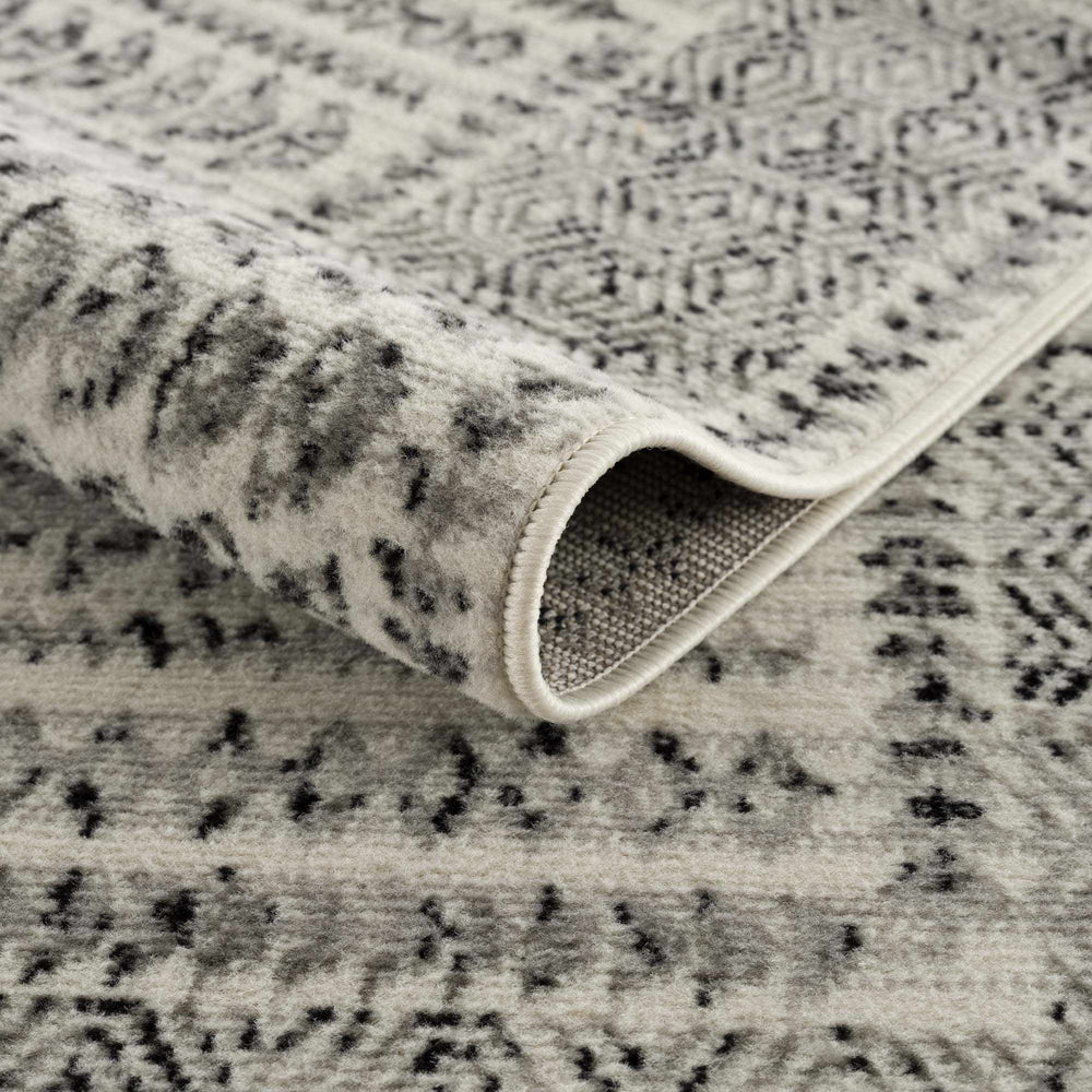 
                      
                        Greig Area Rug
                      
                    