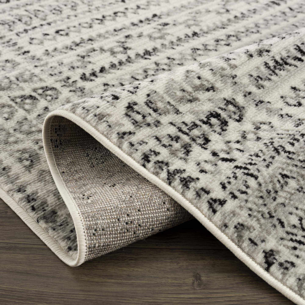 
                      
                        Greig Area Rug
                      
                    