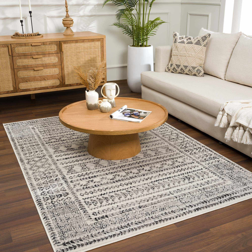 
                      
                        Greig Area Rug
                      
                    