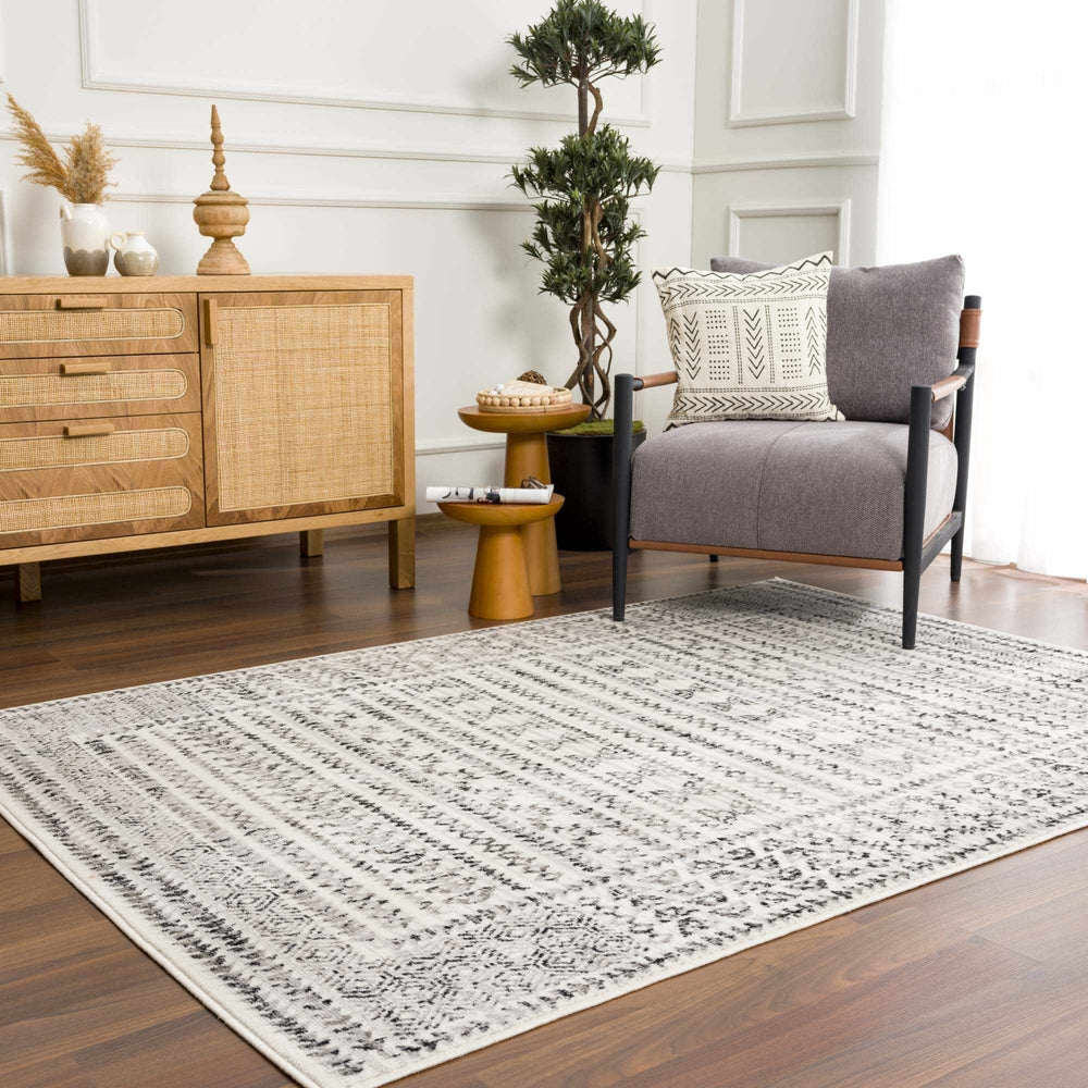 
                      
                        Greig Area Rug
                      
                    