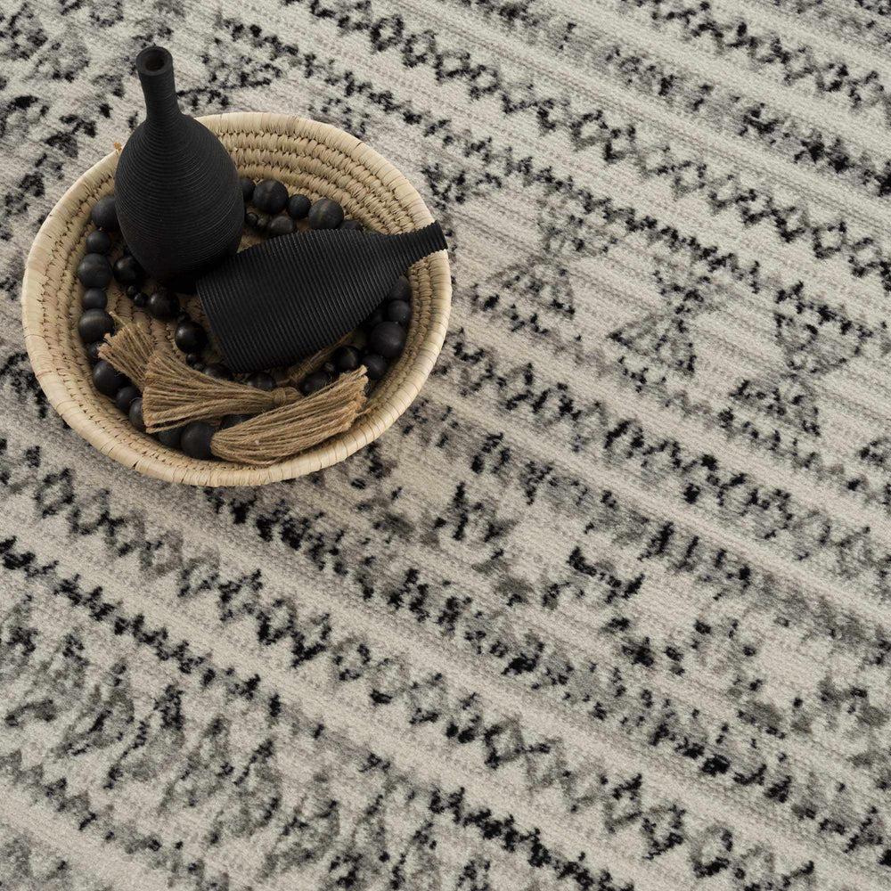 
                      
                        Greig Area Rug
                      
                    