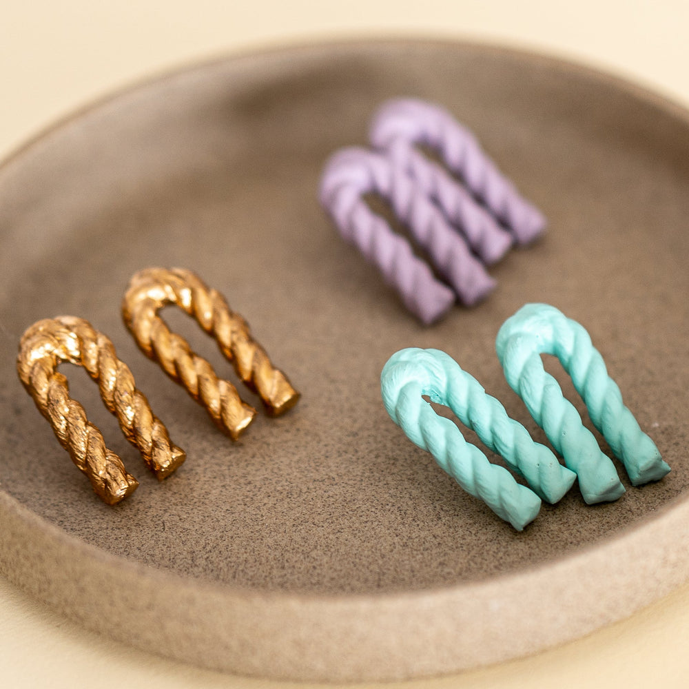 
                      
                        Bent Twizzle Earrings
                      
                    