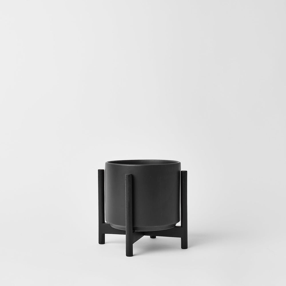 
                      
                        The Six - Ceramic Cylinder with Stand
                      
                    