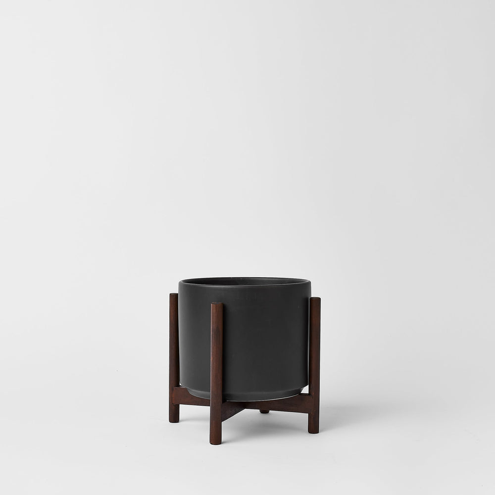 
                      
                        The Six - Ceramic Cylinder with Stand
                      
                    