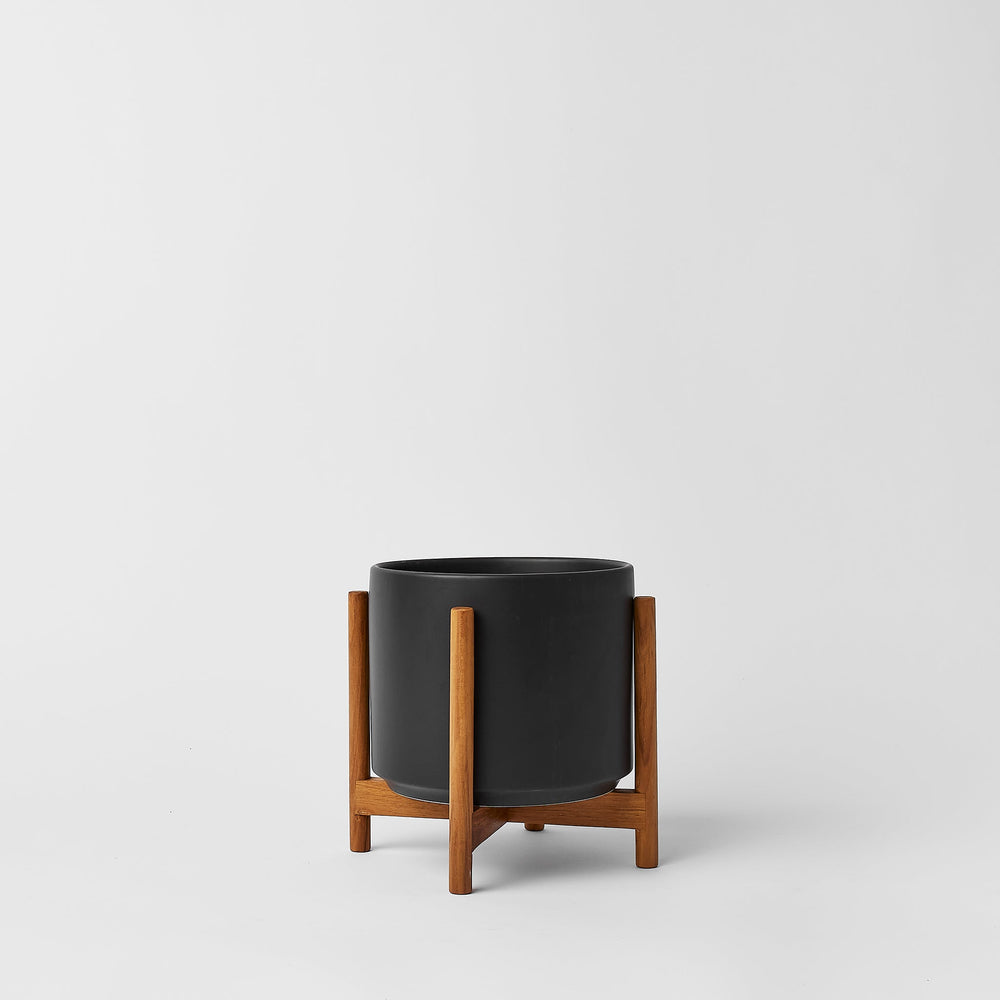 
                      
                        The Six - Ceramic Cylinder with Stand
                      
                    