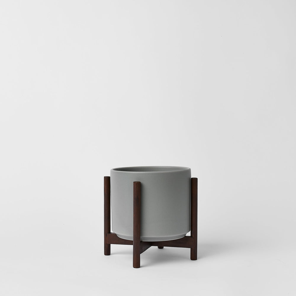 
                      
                        The Six - Ceramic Cylinder with Stand
                      
                    
