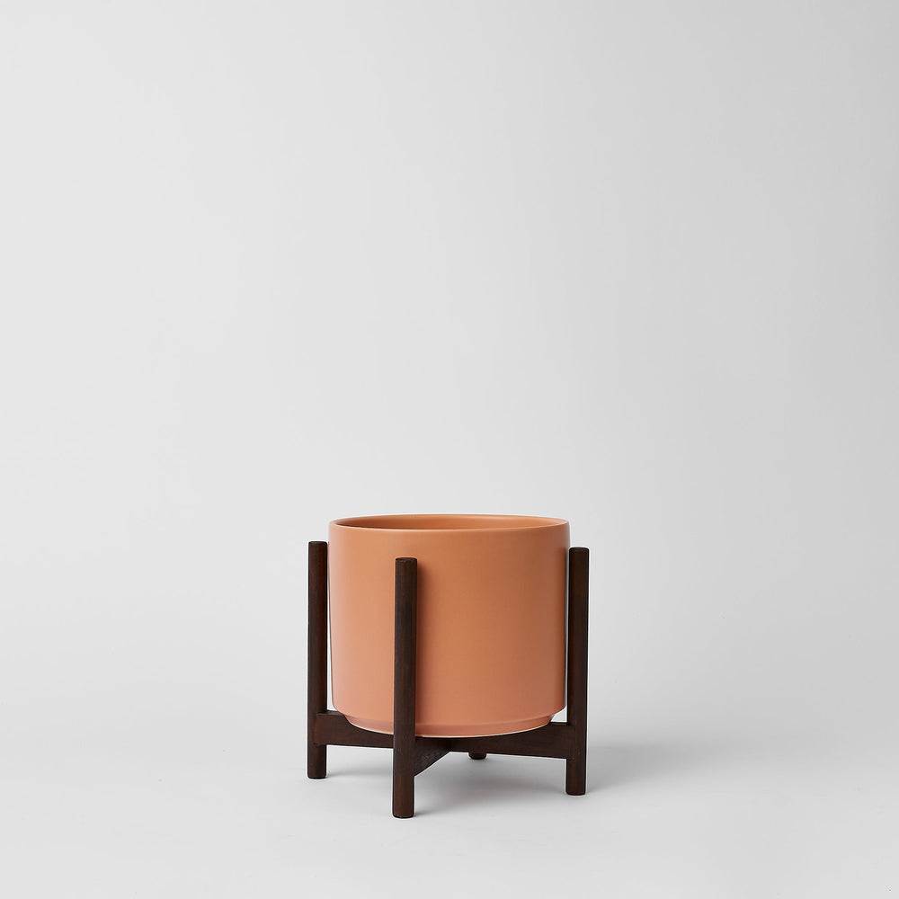 
                      
                        The Six - Ceramic Cylinder with Stand
                      
                    