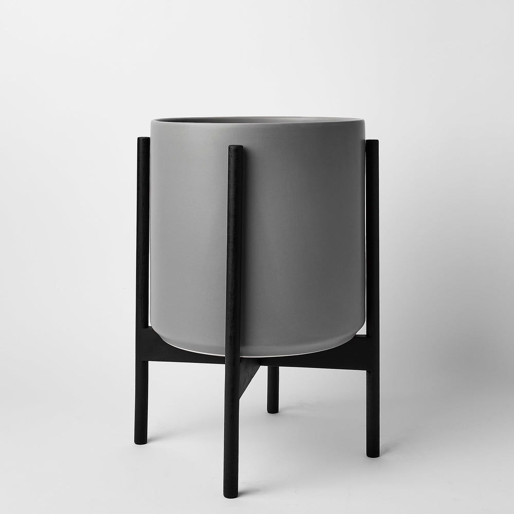 
                      
                        The Twelve - Ceramic Cylinder with Stand
                      
                    