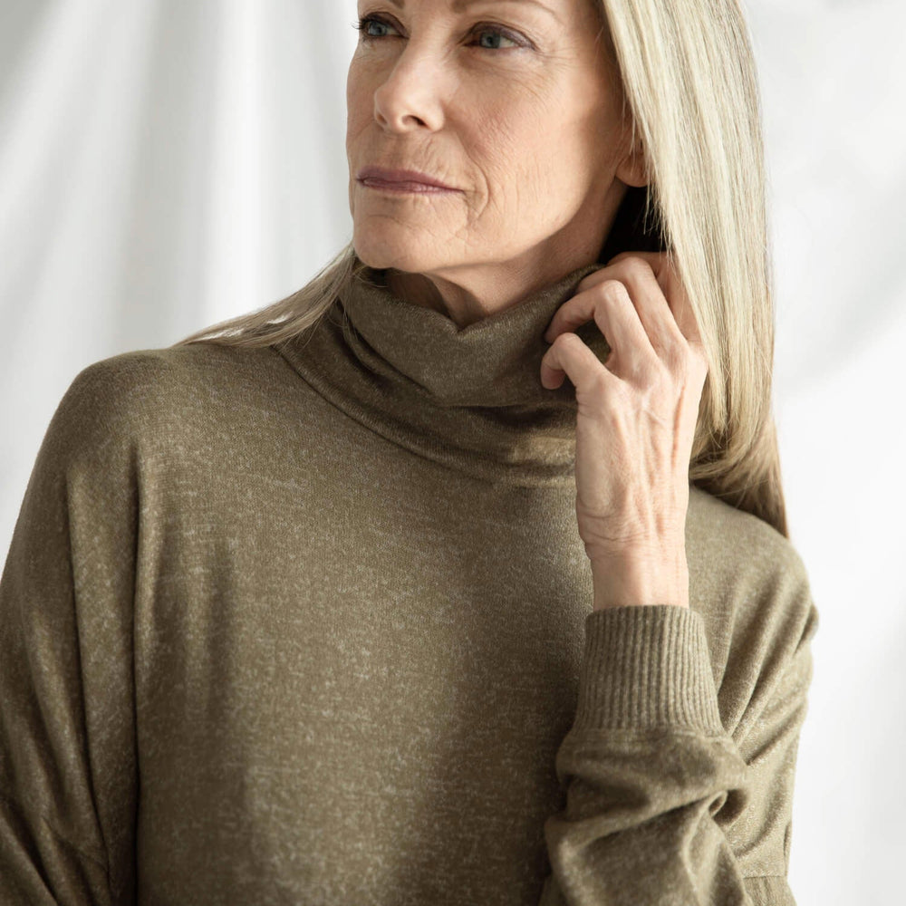 
                      
                        Cosset Relaxed Turtleneck
                      
                    