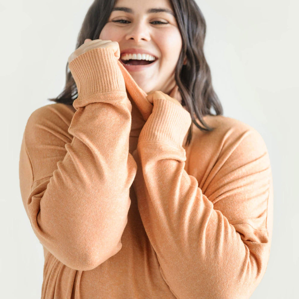 
                      
                        Cosset Relaxed Turtleneck
                      
                    