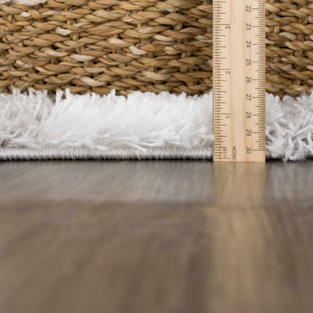 
                      
                        Atira Gray Checkered Area Rug
                      
                    