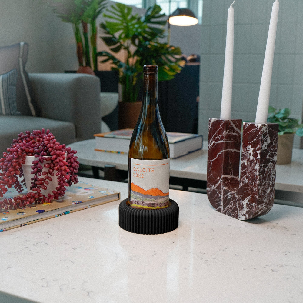 
                      
                        Mid-Century Ribbed Wine Bottle Coaster
                      
                    