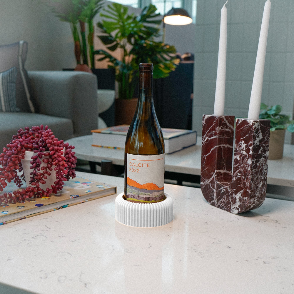 
                      
                        Mid-Century Ribbed Wine Bottle Coaster
                      
                    