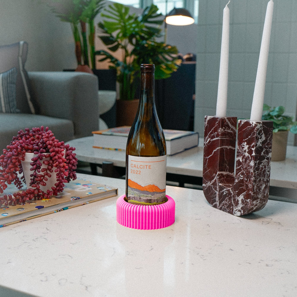 
                      
                        Mid-Century Ribbed Wine Bottle Coaster
                      
                    