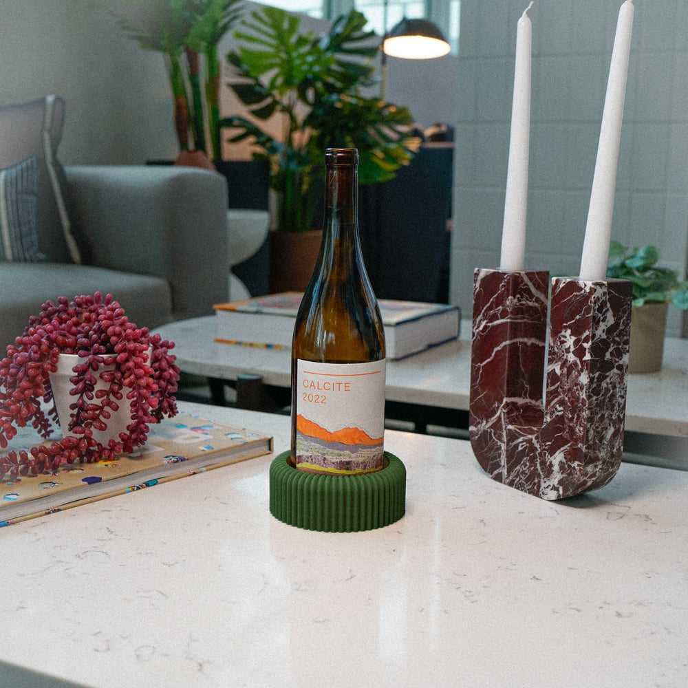 
                      
                        Mid-Century Ribbed Wine Bottle Coaster
                      
                    