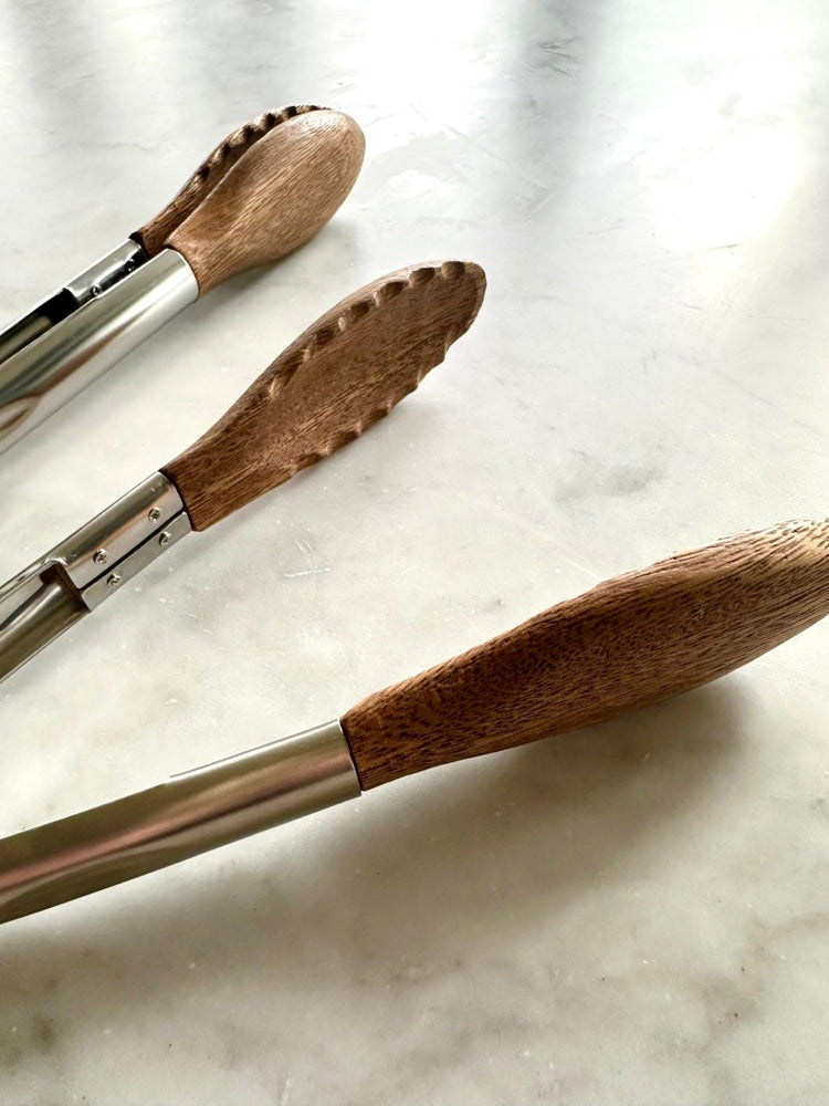 
                      
                        Busa Designs Acacia Wood Tongs, Set of 2 - lily & onyx
                      
                    