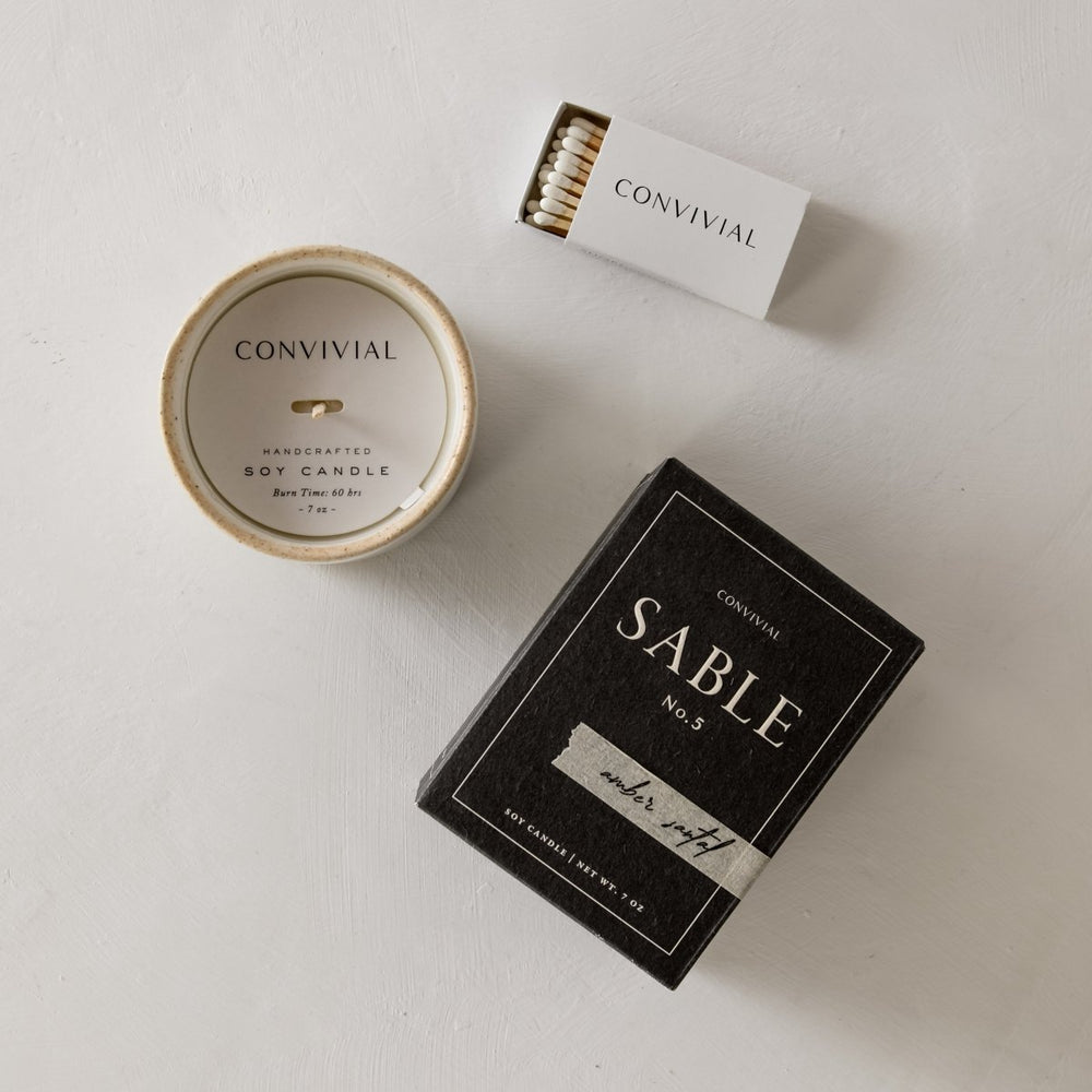 
                      
                        CONVIVIAL Amber Santal | 7 oz Candle - lily & onyx
                      
                    