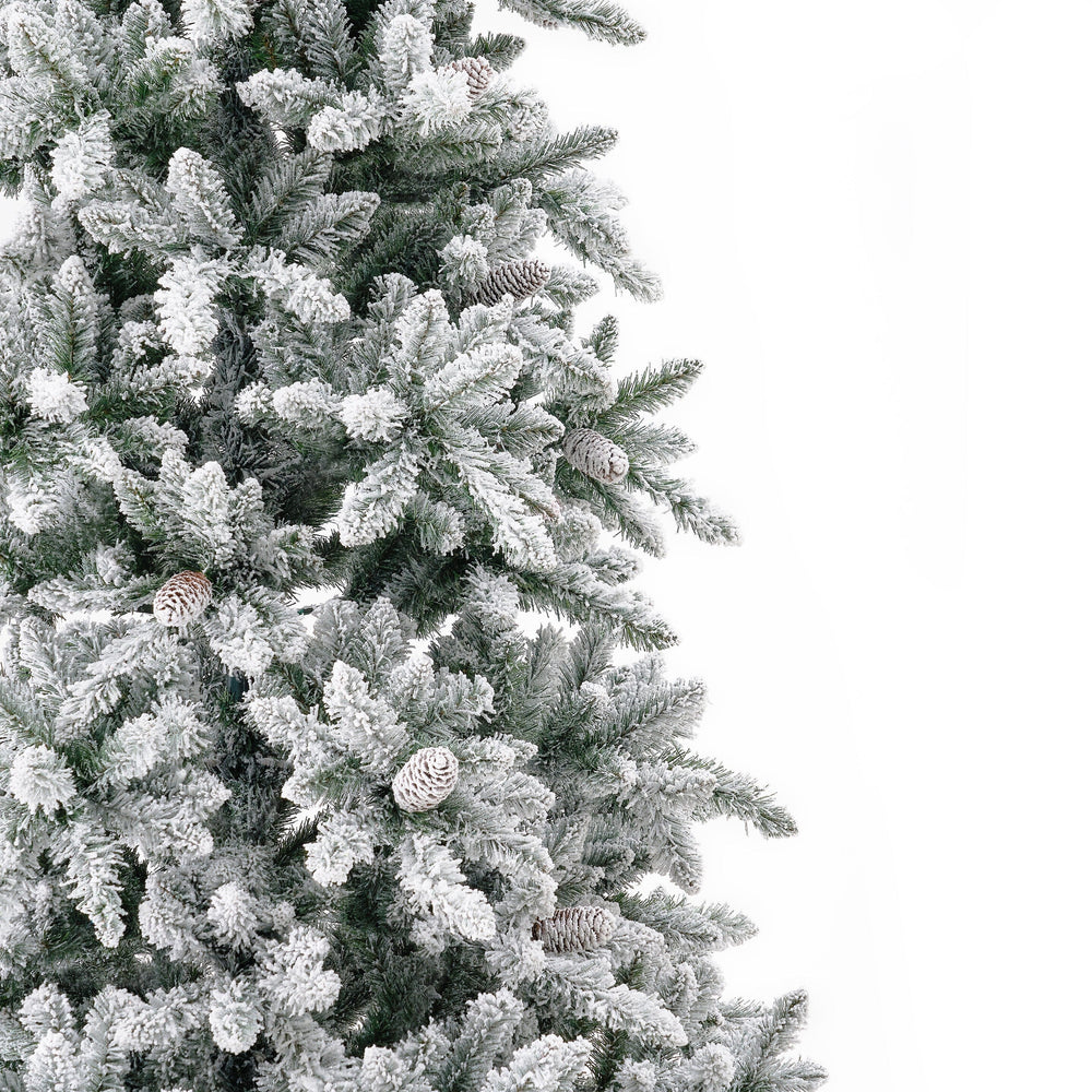 
                      
                        11’ Flocked Livingston Fir Artificial Christmas Tree with Pine Cones, 950 Clear Warm LED Lights and 3016 Bendable Branches
                      
                    