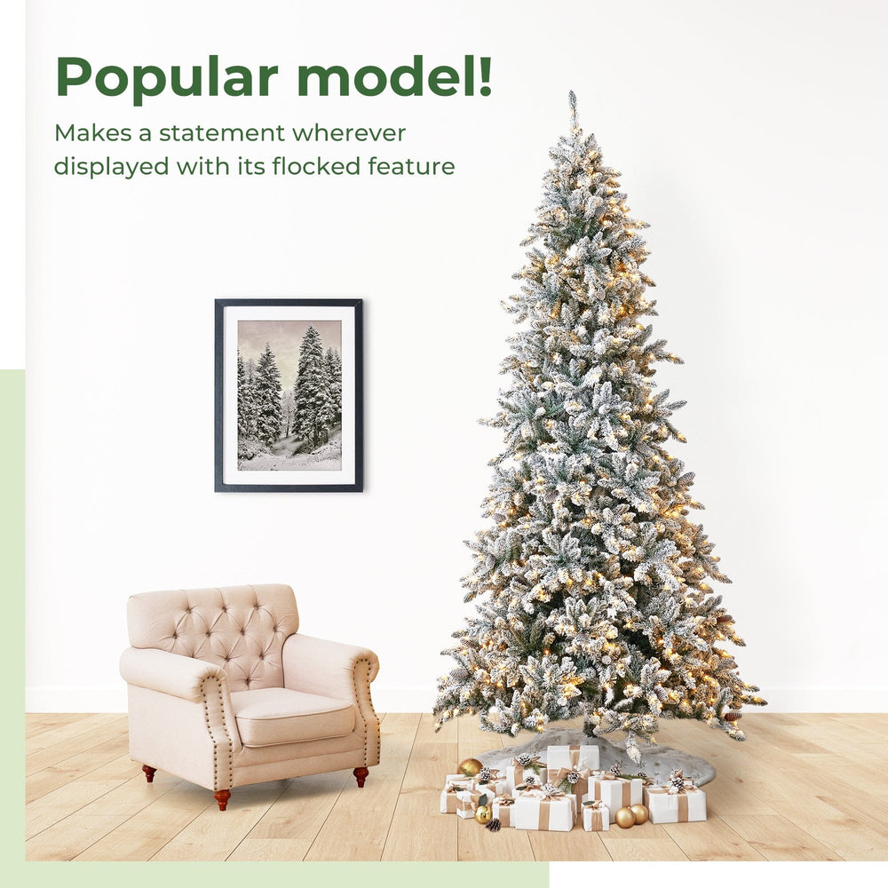 
                      
                        11’ Flocked Livingston Fir Artificial Christmas Tree with Pine Cones, 950 Clear Warm LED Lights and 3016 Bendable Branches
                      
                    