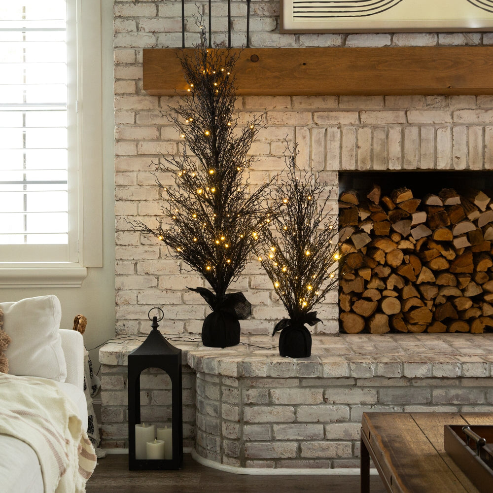 
                      
                        3’ Pre-Lit Halloween Black Twig Artificial Fall Tree in Burlap Planter with 52 Warm White LED Lights
                      
                    